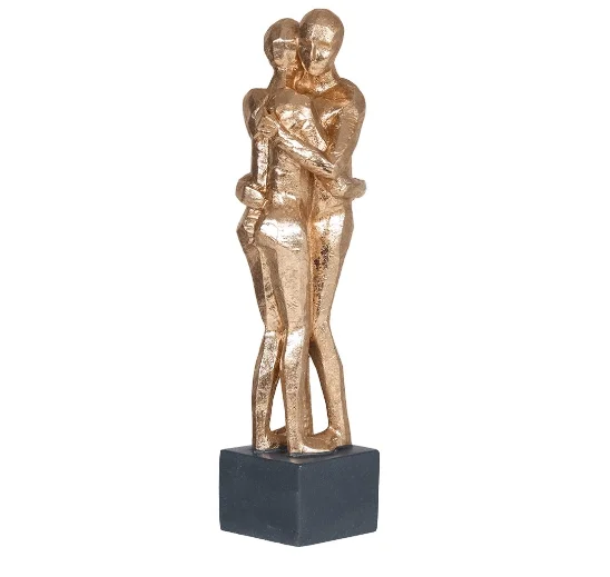Track lighting for replacing old fluorescent fixturesCouple Hugging Sculpture