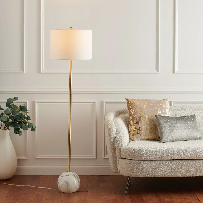 Wood Floor Lamp with Natural Grain for a Warm and Organic FeelWood Floor Lamp with Natural Grain for a Warm and Organic FeelSAFAVIEH Lighting Marjolein Modern 64-inch Floor Lamp - 17 In. W x 17 In. D x 64 In. H - 17Wx17Dx64H Wood Floor Lamp with Natural Grain for a Warm and Organic FeelWood Floor Lamp with Natural Grain for a Warm and Organic FeelSAFAVIEH Lighting Marjolein Modern 64-inch Floor Lamp - 17 In. W x 17 In. D x 64 In. H - 17Wx17Dx64H