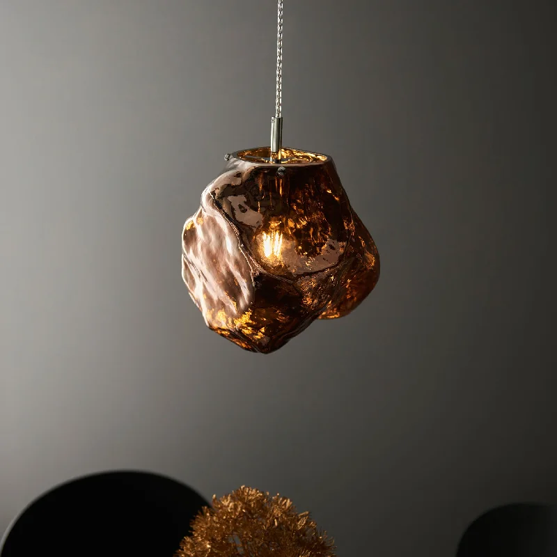 African - Inspired Ceiling Lights with Tribal Patterns and Natural MaterialsAfrican - Inspired Ceiling Lights with Tribal Patterns and Natural MaterialsRock Pendant